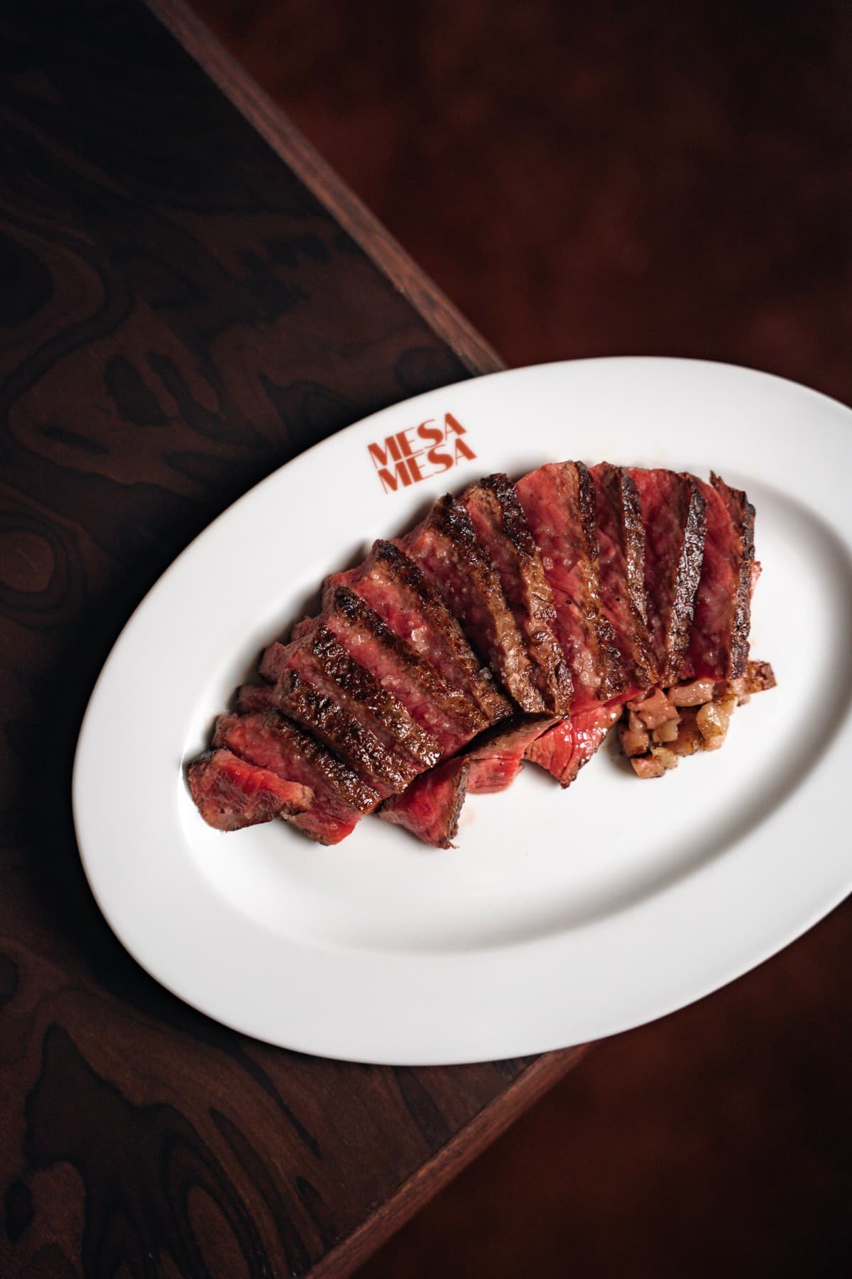 Sliced steak on a Mesa Mesa platter